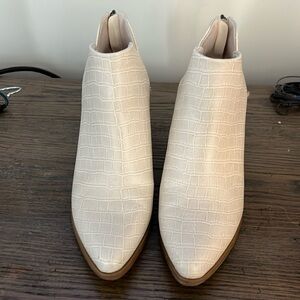 Michael Shannon white leather ankle boots